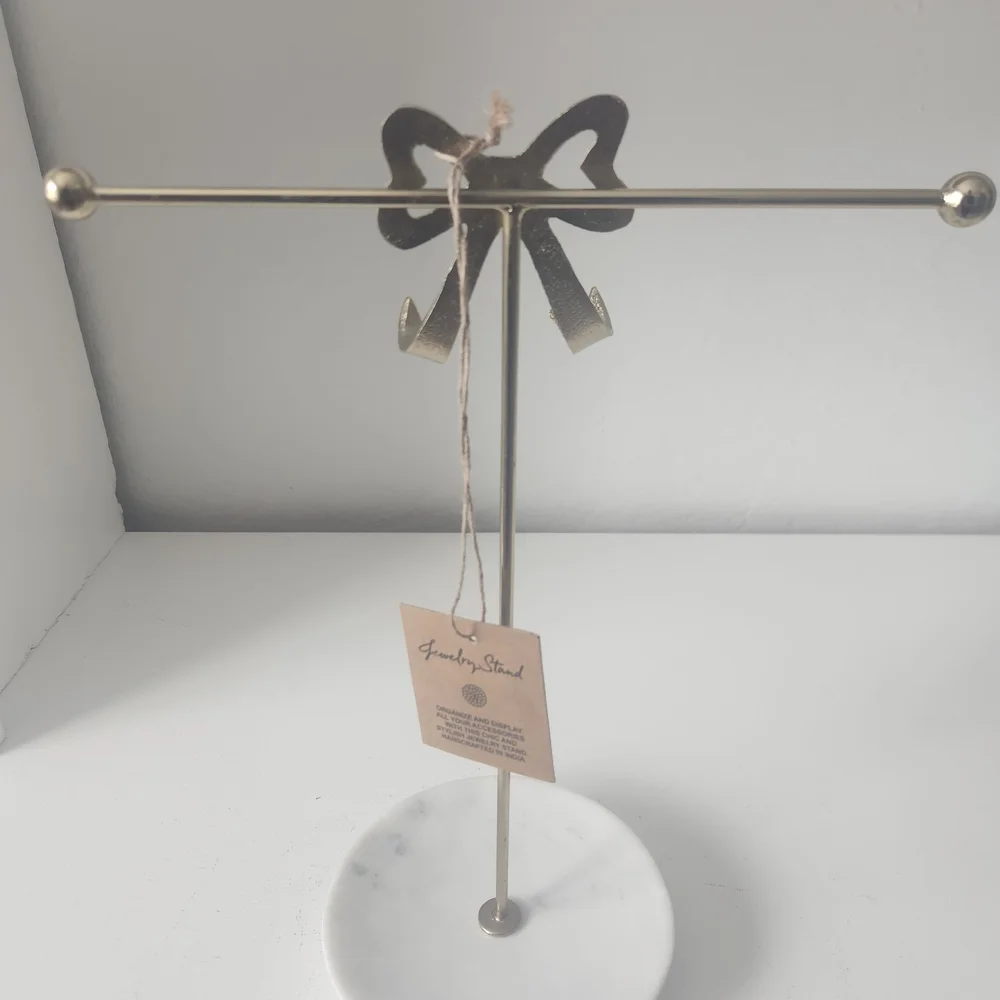Gold Bow Jewelry Organizer Or Hand Towel Holder With White Marble Base